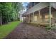 Grassy backyard with multiple deck levels at 11280 Brookhollow Trl, Alpharetta, GA 30022