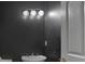 Powder room features a modern vanity and stylish light fixture at 11280 Brookhollow Trl, Alpharetta, GA 30022