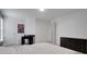 Bedroom with a workspace area, dresser, and comfy bed at 11280 Brookhollow Trl, Alpharetta, GA 30022