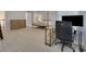Large bedroom with designated work space features neutral carpeting and large windows at 11280 Brookhollow Trl, Alpharetta, GA 30022