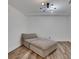 Bedroom offers wood flooring and a modern ceiling light fixture at 11280 Brookhollow Trl, Alpharetta, GA 30022