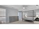 The expansive bedroom boasts trey ceilings and includes a sitting area and stylish gray dresser at 11280 Brookhollow Trl, Alpharetta, GA 30022