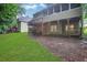 Backyard view with decks and stairs at 11280 Brookhollow Trl, Alpharetta, GA 30022