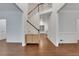 Bright foyer featuring hardwood floors, high ceilings, and an open staircase, creating a welcoming entrance at 11280 Brookhollow Trl, Alpharetta, GA 30022