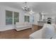 Inviting open-plan space connecting kitchen and living area with abundant natural light at 11280 Brookhollow Trl, Alpharetta, GA 30022