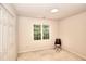 Bedroom with carpet, and a small window at 1875 Skidmore Cir, Lawrenceville, GA 30044