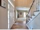 Open foyer features a staircase and hardwood floors at 1875 Skidmore Cir, Lawrenceville, GA 30044