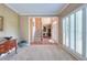 Inviting foyer with staircase and view of the front entrance at 1875 Skidmore Cir, Lawrenceville, GA 30044