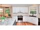 Bright kitchen featuring a stylish island and stainless steel oven at 1875 Skidmore Cir, Lawrenceville, GA 30044