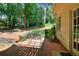 Charming outdoor patio with brick pavers and a relaxing seating area at 1875 Skidmore Cir, Lawrenceville, GA 30044