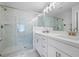 Elegant bathroom featuring a large glass shower and double vanity at 3322 Cranston Ln, Kennesaw, GA 30144