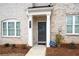 Close-up of the front entryway, with brick siding and well-maintained landscaping at 3322 Cranston Ln, Kennesaw, GA 30144