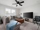 Spacious living room featuring a comfortable sectional and a large TV at 3322 Cranston Ln, Kennesaw, GA 30144