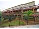 View of the back of the townhome showing a multiple level deck at 4104 Townsend Ln, Dunwoody, GA 30346