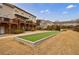 A luxurious multi-Gathering home has a beautiful, artificial turf backyard game area at 4104 Townsend Ln, Dunwoody, GA 30346