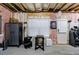 Spacious unfinished basement provides ample storage and access to the exterior at 4104 Townsend Ln, Dunwoody, GA 30346