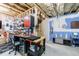 Workshop in unfinished basement provides ample storage, work space and utility at 4104 Townsend Ln, Dunwoody, GA 30346