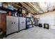Basement storage area with ample shelving and cabinets, perfect for organization at 4104 Townsend Ln, Dunwoody, GA 30346