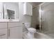 Clean bathroom with a modern vanity, a toilet, and a glass shower at 4104 Townsend Ln, Dunwoody, GA 30346
