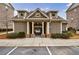 Attractive clubhouse with stone accents, welcoming entryway, and access to community amenities at 4104 Townsend Ln, Dunwoody, GA 30346