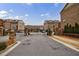 Gated community entrance with well-maintained landscaping and security features at 4104 Townsend Ln, Dunwoody, GA 30346