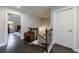 A staircase connects two floors, revealing the bedroom and other rooms on the upper level at 4104 Townsend Ln, Dunwoody, GA 30346