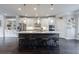 Bright kitchen with a large island, stainless steel appliances, and hardwood floors at 4104 Townsend Ln, Dunwoody, GA 30346