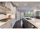 Modern kitchen with stainless steel appliances and a large island at 4104 Townsend Ln, Dunwoody, GA 30346