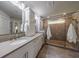 The main bathroom features dual sinks and a walk-in shower at 4104 Townsend Ln, Dunwoody, GA 30346