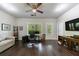 Spacious office room with a large window, sofa, and exterior balcony door at 4104 Townsend Ln, Dunwoody, GA 30346