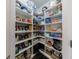 Walk-in pantry with lots of shelving, great for storage and organizing food at 4104 Townsend Ln, Dunwoody, GA 30346