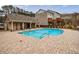 Sparkling community pool and surrounding lounge area at 4104 Townsend Ln, Dunwoody, GA 30346