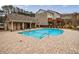 Community pool with lounge area and restroom building at 4104 Townsend Ln, Dunwoody, GA 30346