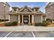Community pool house with attractive architectural features and well-maintained landscaping at 4104 Townsend Ln, Dunwoody, GA 30346