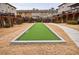 Community putting green, walkway, and patio at 4104 Townsend Ln, Dunwoody, GA 30346