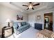 Bright sitting room with neutral walls and ceiling, modern furniture, and lots of natural light at 4104 Townsend Ln, Dunwoody, GA 30346