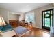 Cozy living room with hardwood floors, a large window, and a decorative rug at 5839 Darry Cir, Norcross, GA 30093