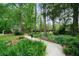 Enjoy the outdoors on this home's long stone walkway and lush scenery that surrounds this charming home at 5839 Darry Cir, Norcross, GA 30093