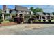 Beautiful home featuring a brick and stone circular driveway and a manicured landscape at 1695 Whitley Rd, Dacula, GA 30019