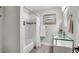 Charming bathroom featuring a glass bowl sink and a combined tub and shower at 3726 Scotts Mill Run, Peachtree Corners, GA 30096