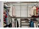 Organized closet with custom shelving and hanging rods for ample storage space at 3726 Scotts Mill Run, Peachtree Corners, GA 30096