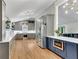 Modern kitchen features custom cabinets, stainless steel appliances, and stylish lighting at 3726 Scotts Mill Run, Peachtree Corners, GA 30096