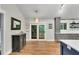 Eat-in kitchen with stainless steel appliances, lots of cabinetry, and sliding glass doors at 3726 Scotts Mill Run, Peachtree Corners, GA 30096