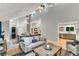 An open concept living room with hardwood floors, high ceilings, and modern decor at 3726 Scotts Mill Run, Peachtree Corners, GA 30096