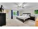 Cozy main bedroom with neutral tones, plush carpeting, and large windows at 3726 Scotts Mill Run, Peachtree Corners, GA 30096