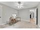 Office with neutral tones, recessed lights, and a view into another room at 3726 Scotts Mill Run, Peachtree Corners, GA 30096