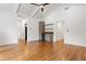 Spacious primary bedroom features vaulted ceiling, ceiling fan, and hardwood floors at 1036 Dell Se Ave, Smyrna, GA 30080