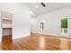 Bedroom boasting hardwood floors, walk in closet, and access to an outdoor deck at 1036 Dell Se Ave, Smyrna, GA 30080