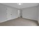 Neutral bedroom features carpet floors, a ceiling light, and a walk in closet at 1335 Seneca, Cumming, GA 30041
