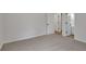Spacious carpeted bedroom with an en suite bathroom and ample natural light at 1335 Seneca, Cumming, GA 30041